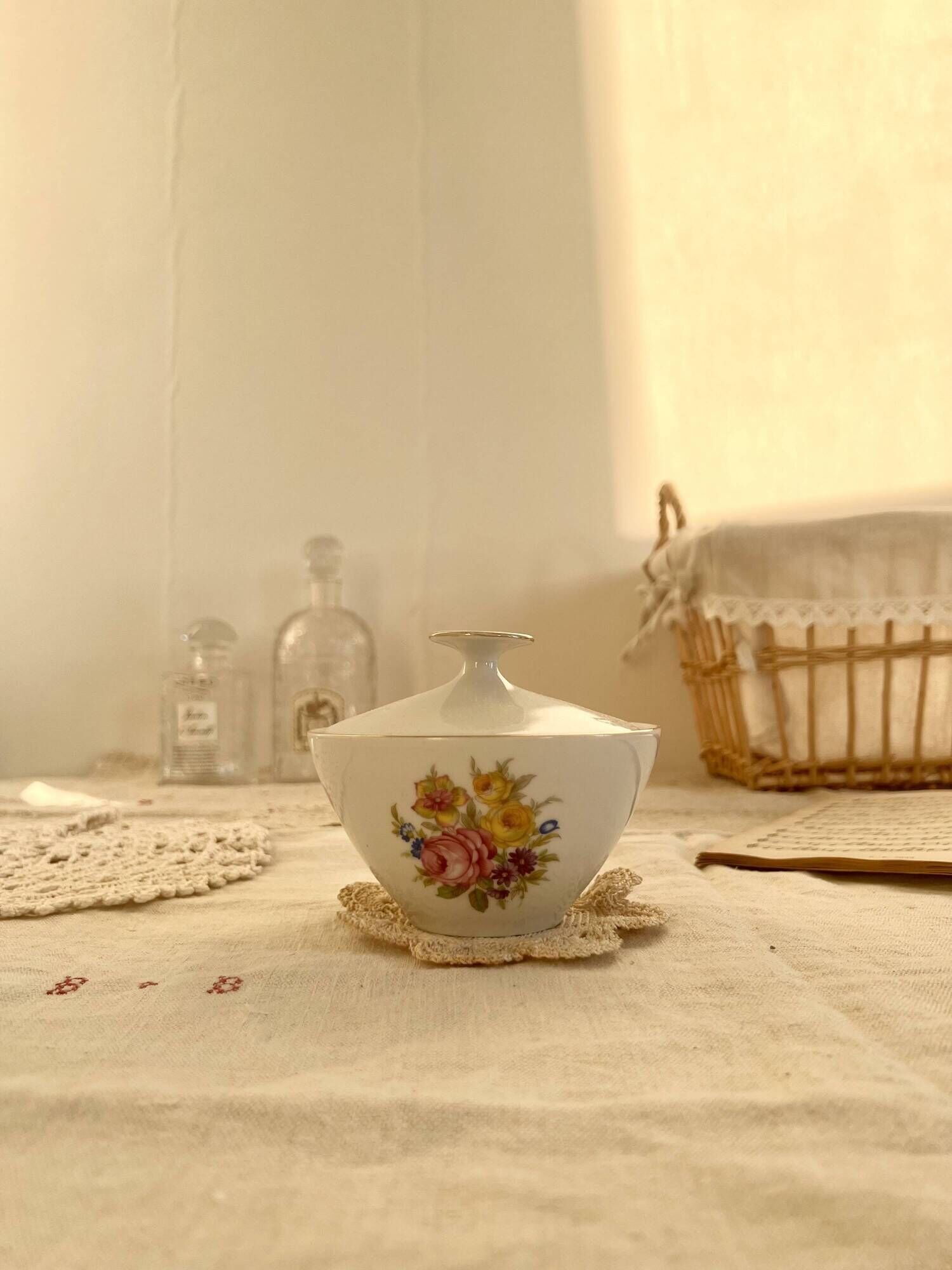 Vintage white porcelain sugar bowl and cottage core floral pattern