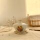Vintage white porcelain sugar bowl and cottage core floral pattern