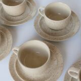 Coffee cup and vintage pyrity sandstone subcup