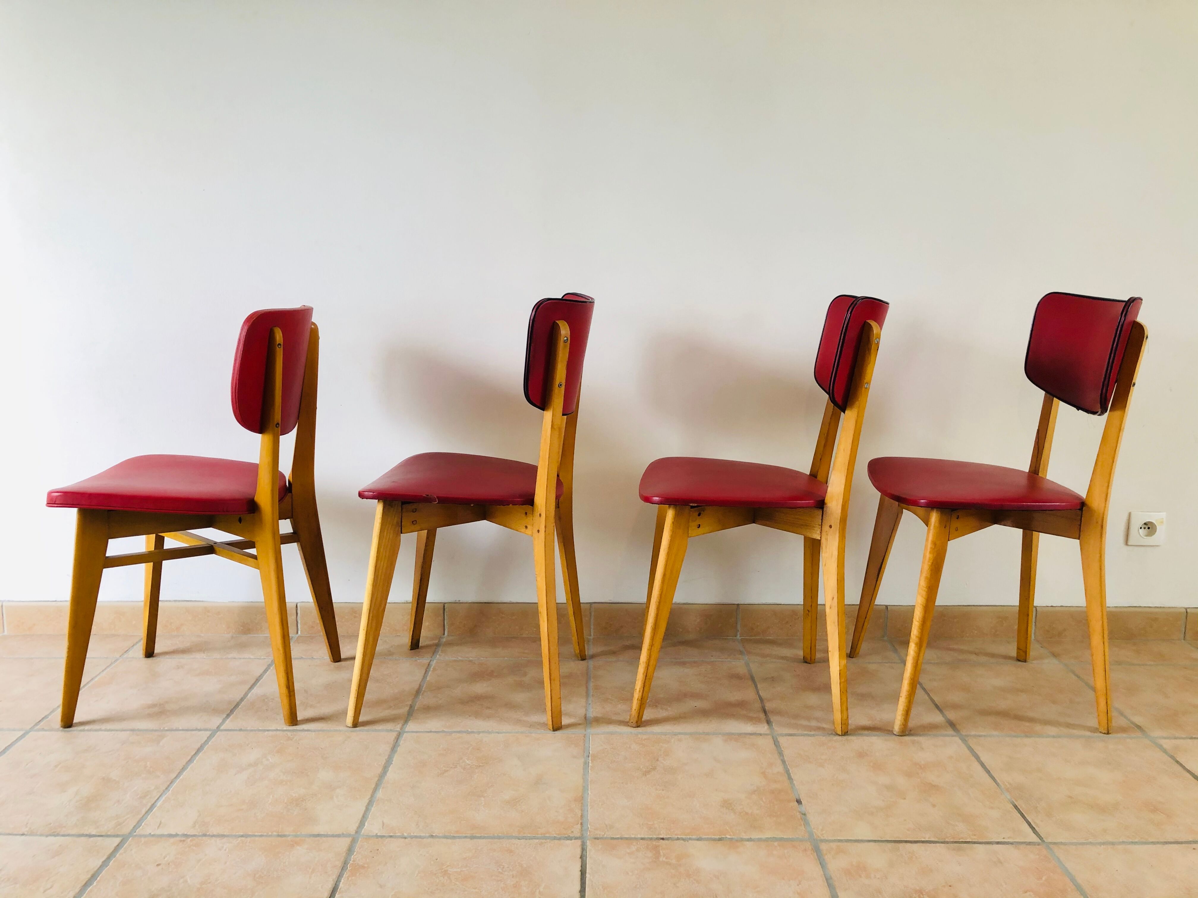 Set of 4 vintage chairs in oak and skai 1970