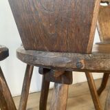 4 brutalist farm tripod chairs