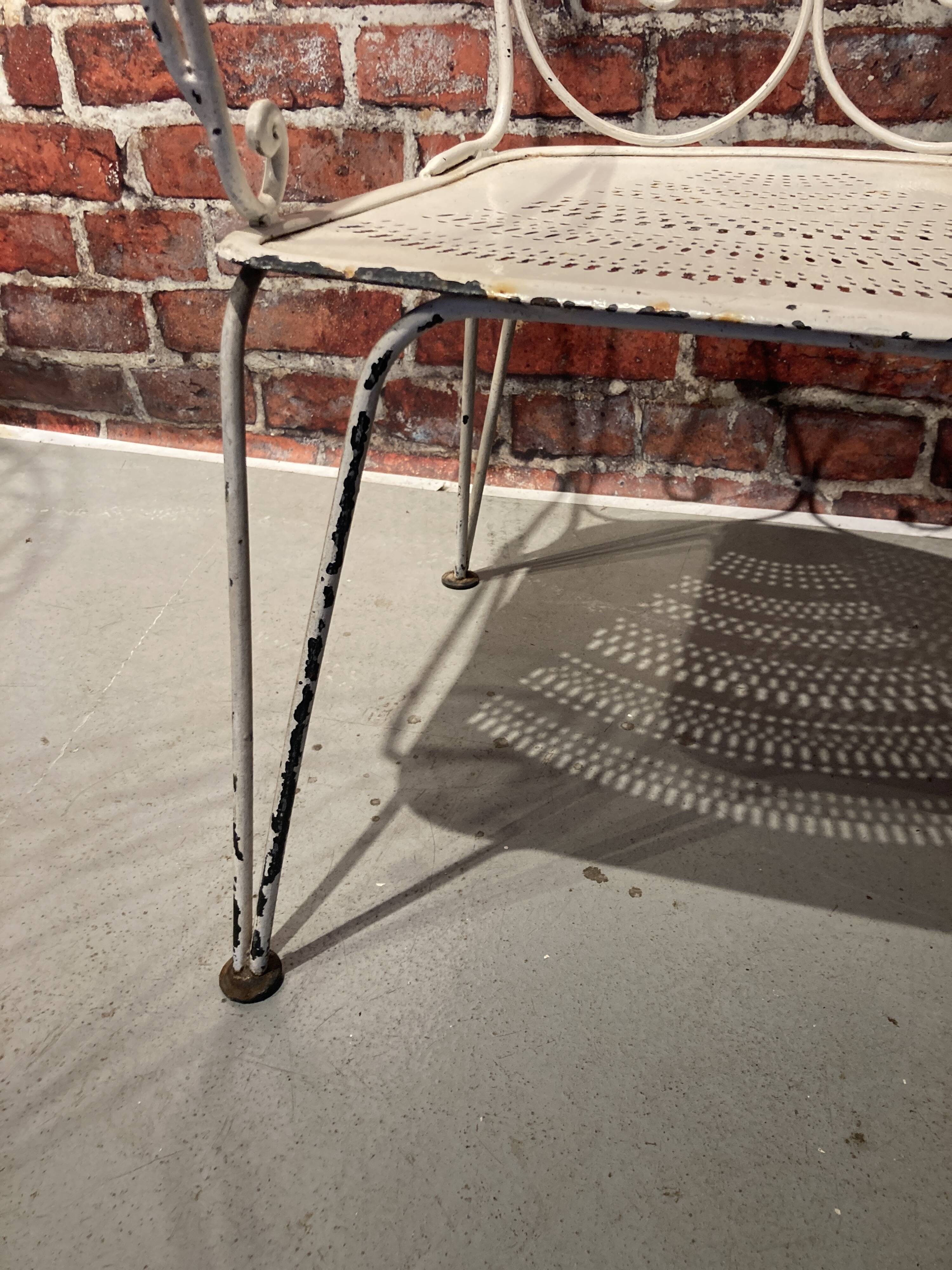 Wrought iron garden set painted white