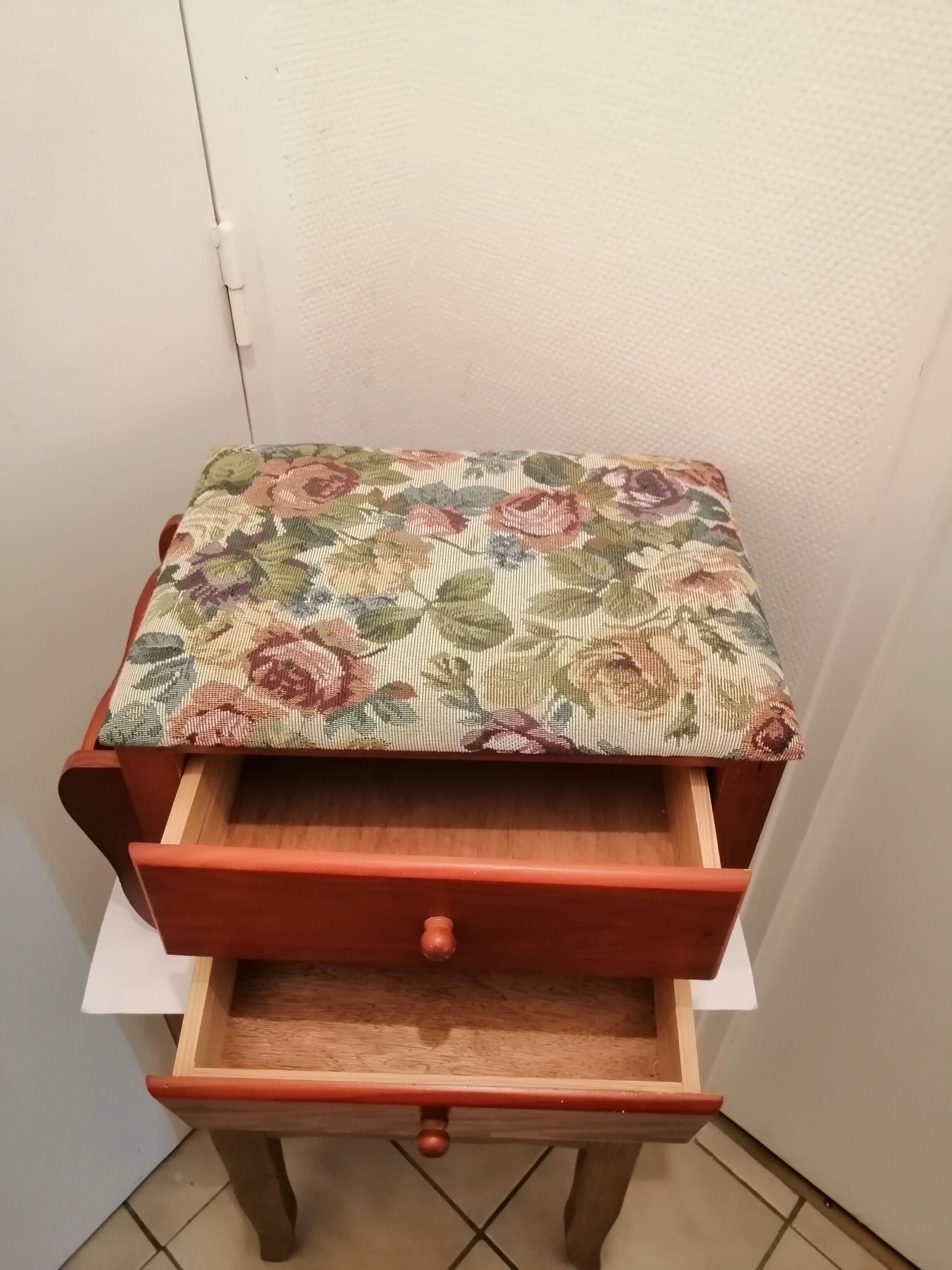 Wooden and fabric footrest with 2 drawers and book rack