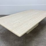 Rectangular travertine coffee table with central leg