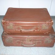 Pair of red suitcases from the 1950s