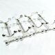 SET OF 12 SILVER-PLATED KNIFE RESTS