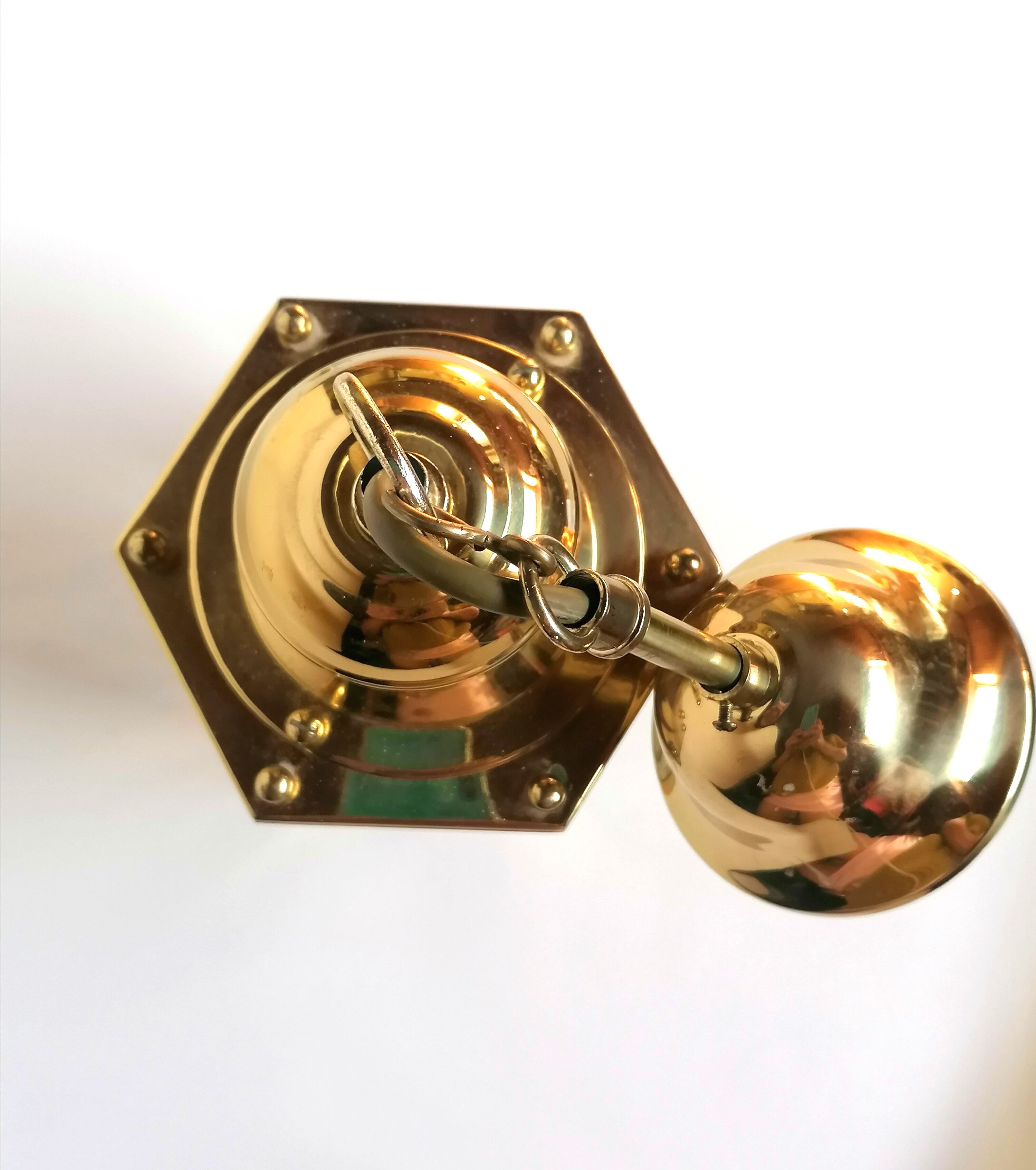 Golden hanging lamp with bevelled glasses