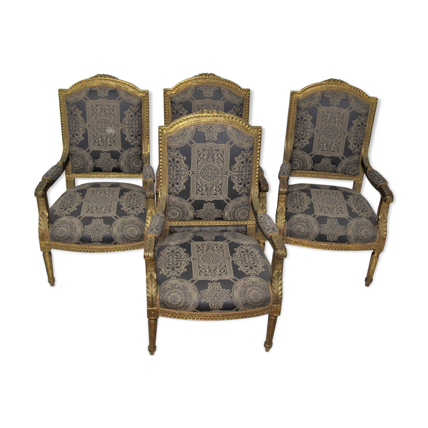 4 armchairs and a gilded wooden sofa Louis XVI style