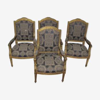 4 armchairs and a gilded wooden sofa Louis XVI style