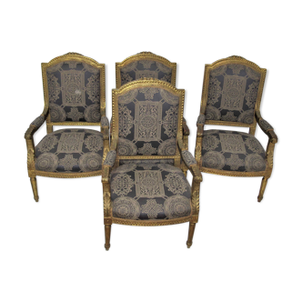 4 armchairs and a gilded wooden sofa Louis XVI style