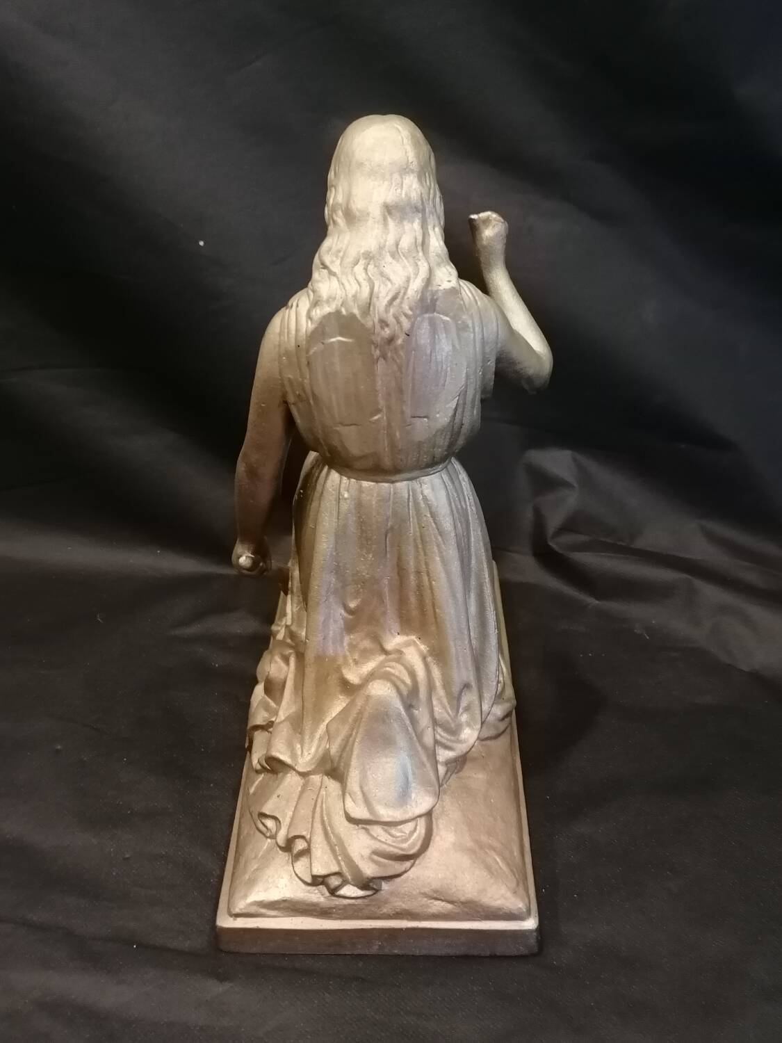 Statuette of a woman in gilded cast iron (Joan of Arc?)
