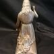 Statuette of a woman in gilded cast iron (Joan of Arc?)