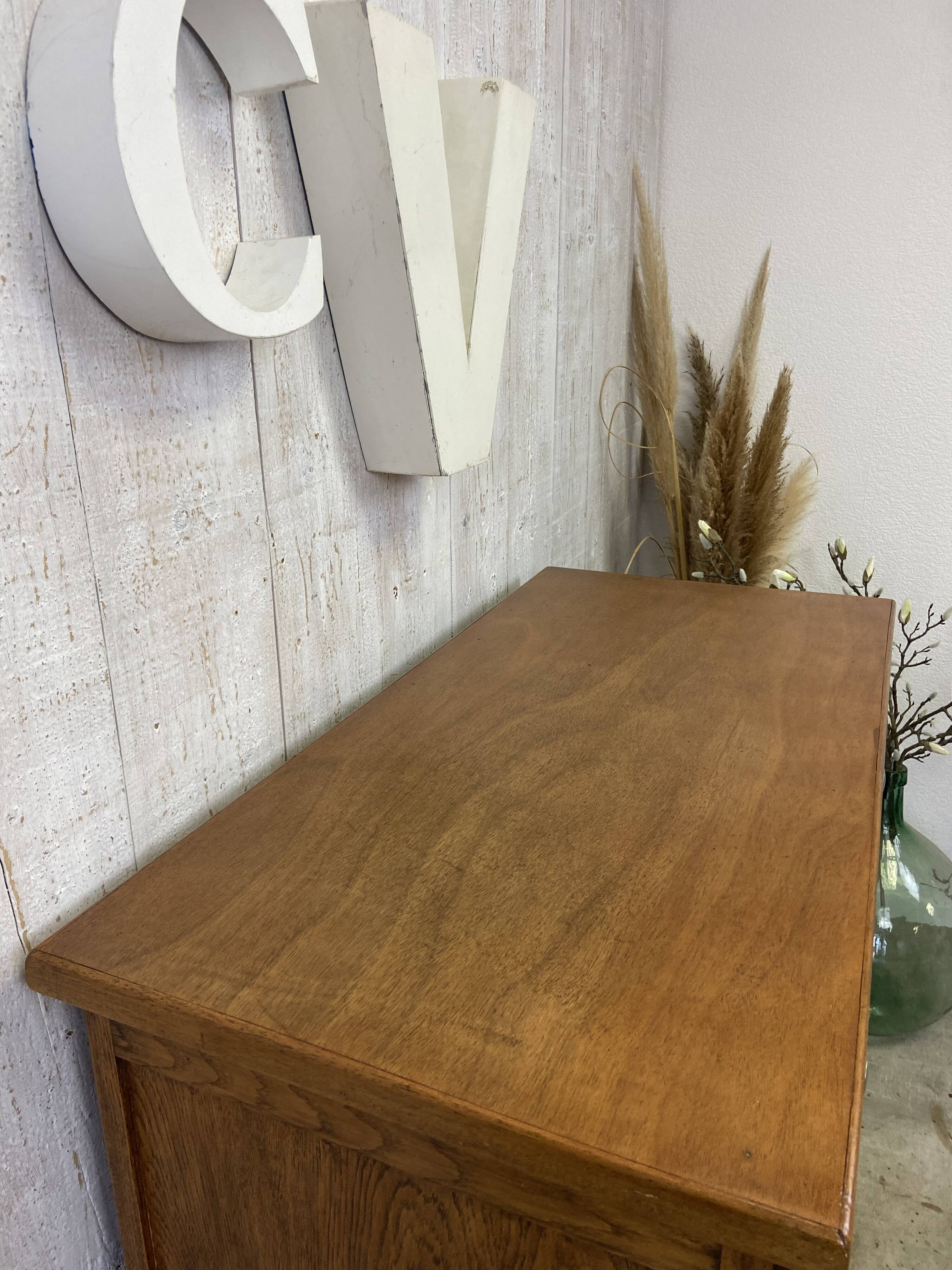 Vintage sideboard with "moustache" base