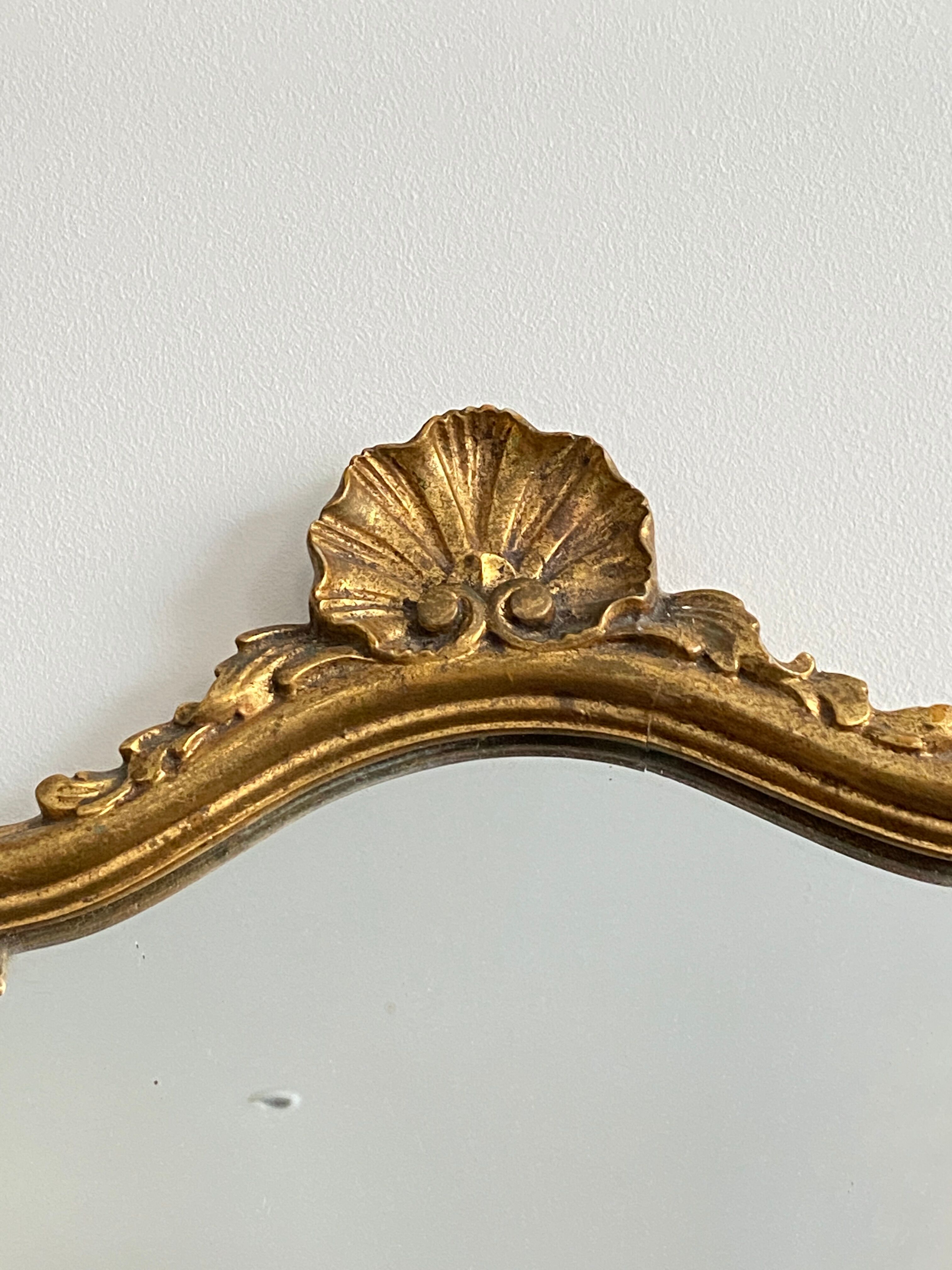 Old rocaille gilded mirror