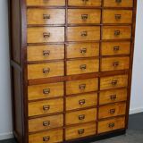 School cabinet bank of vintage Dutch drawers in mid-twentieth century pine