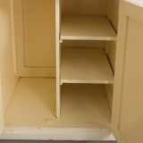 Small accent cabinet with drawers and swing doors