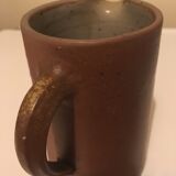 Small pitcher in patinated sandstone