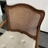 Regency canned armchair in carved walnut