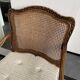 Regency canned armchair in carved walnut