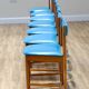 7 chaises de salle à manger McIntosh en vinyle bleu