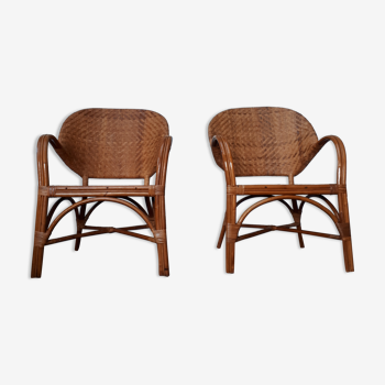 Pair of armchairs in braided rattan 70s