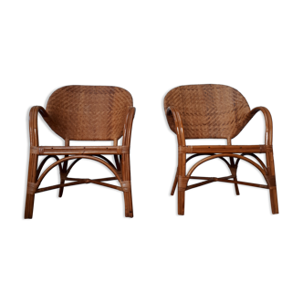 Pair of armchairs in braided rattan 70s
