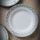 Set 4 green mismatched plates