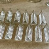 12 portes couteaux en verre.