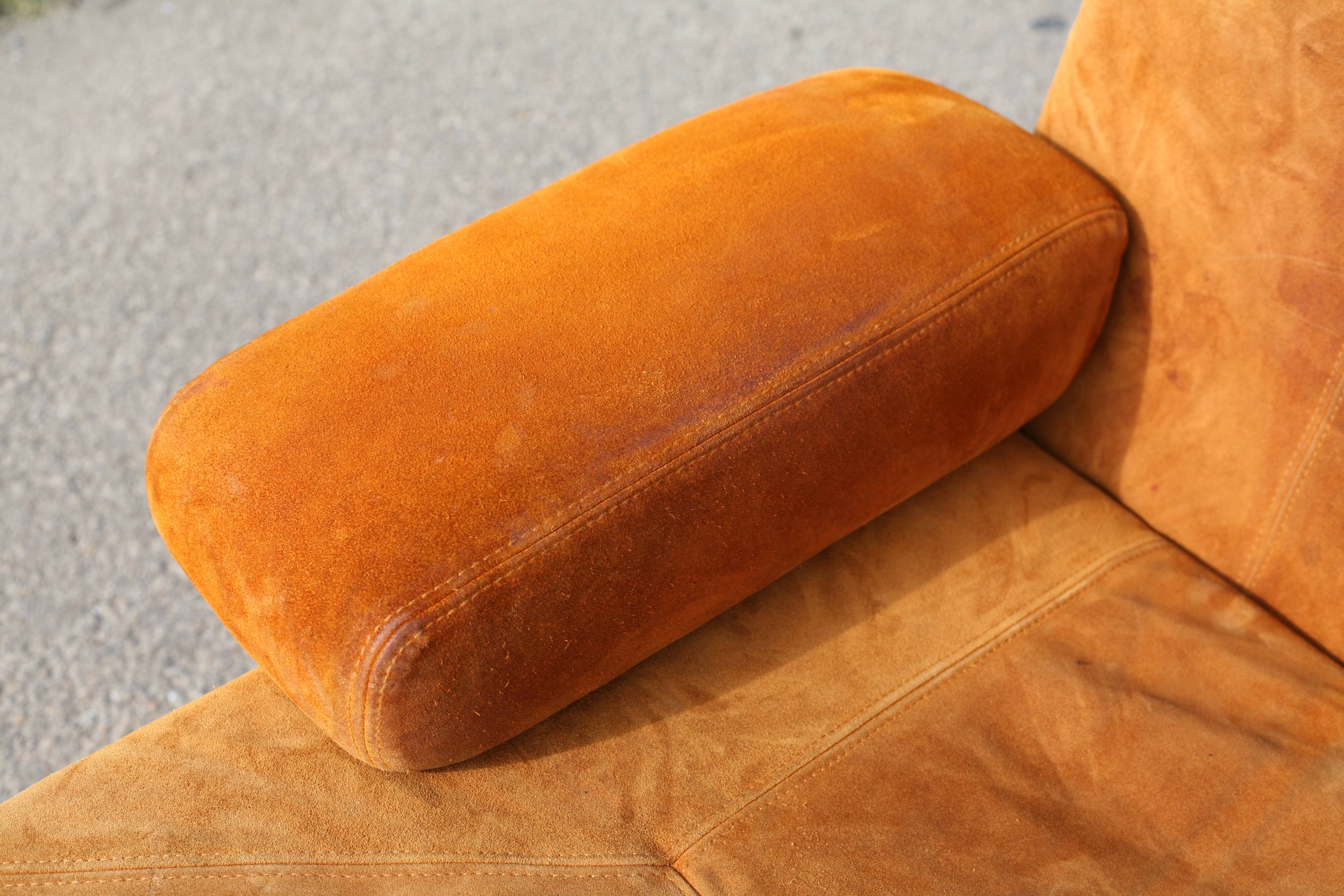 Orange suede leather and steel sofa. Circa 1970