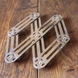 Vintage accordion folding metal trivet