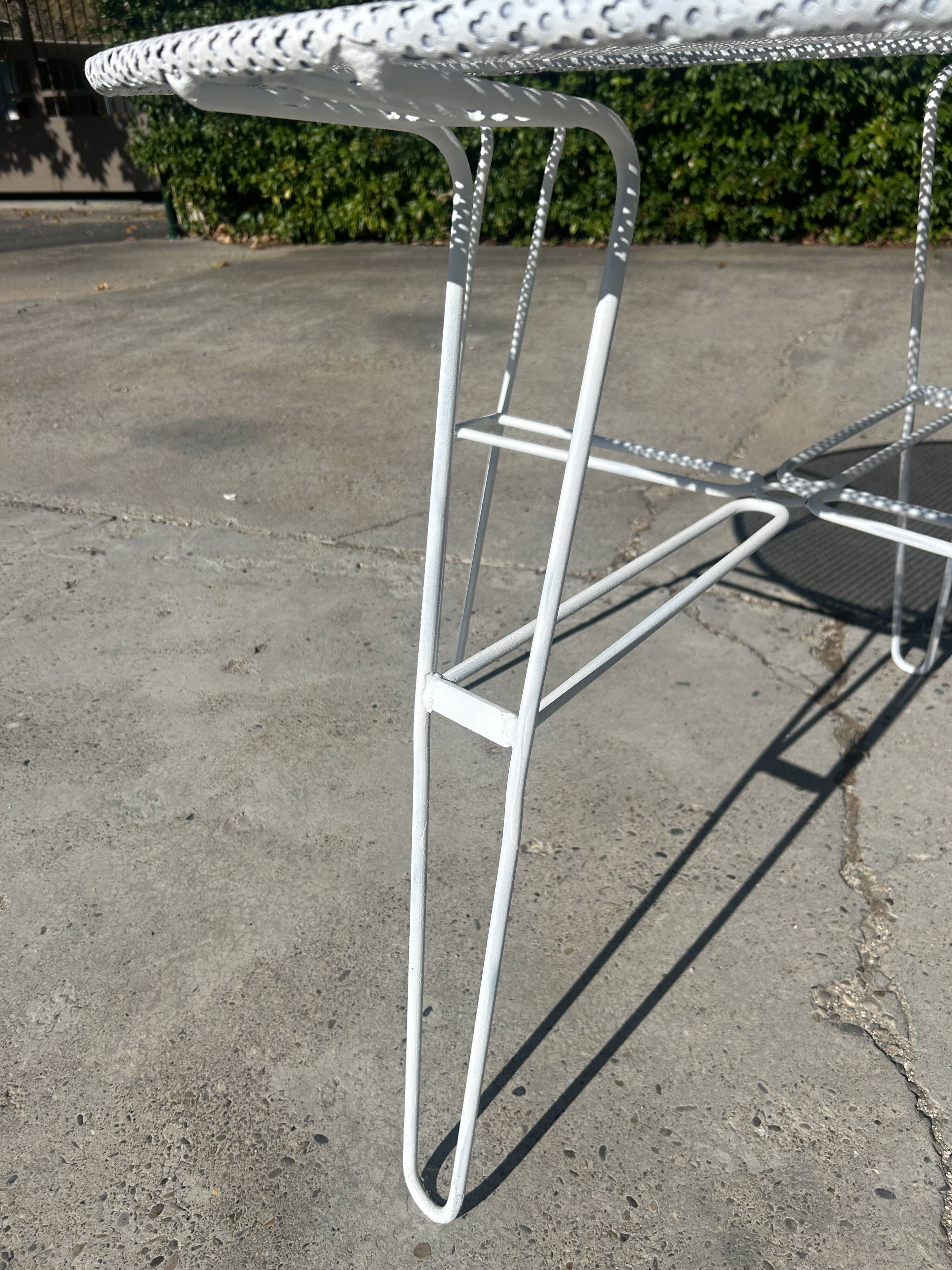 Garden table attributed to Mathieu Mategot from the 1950s.