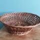 Antique basket, fruit basket or bread basket made of wicker