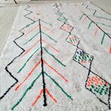 White wool Berber rug with fluorescent orange green patterns