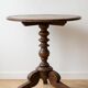 Antique wooden guéridon with a tilting top.