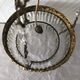 Vintage tassel chandelier has 2 glass and brass crowns