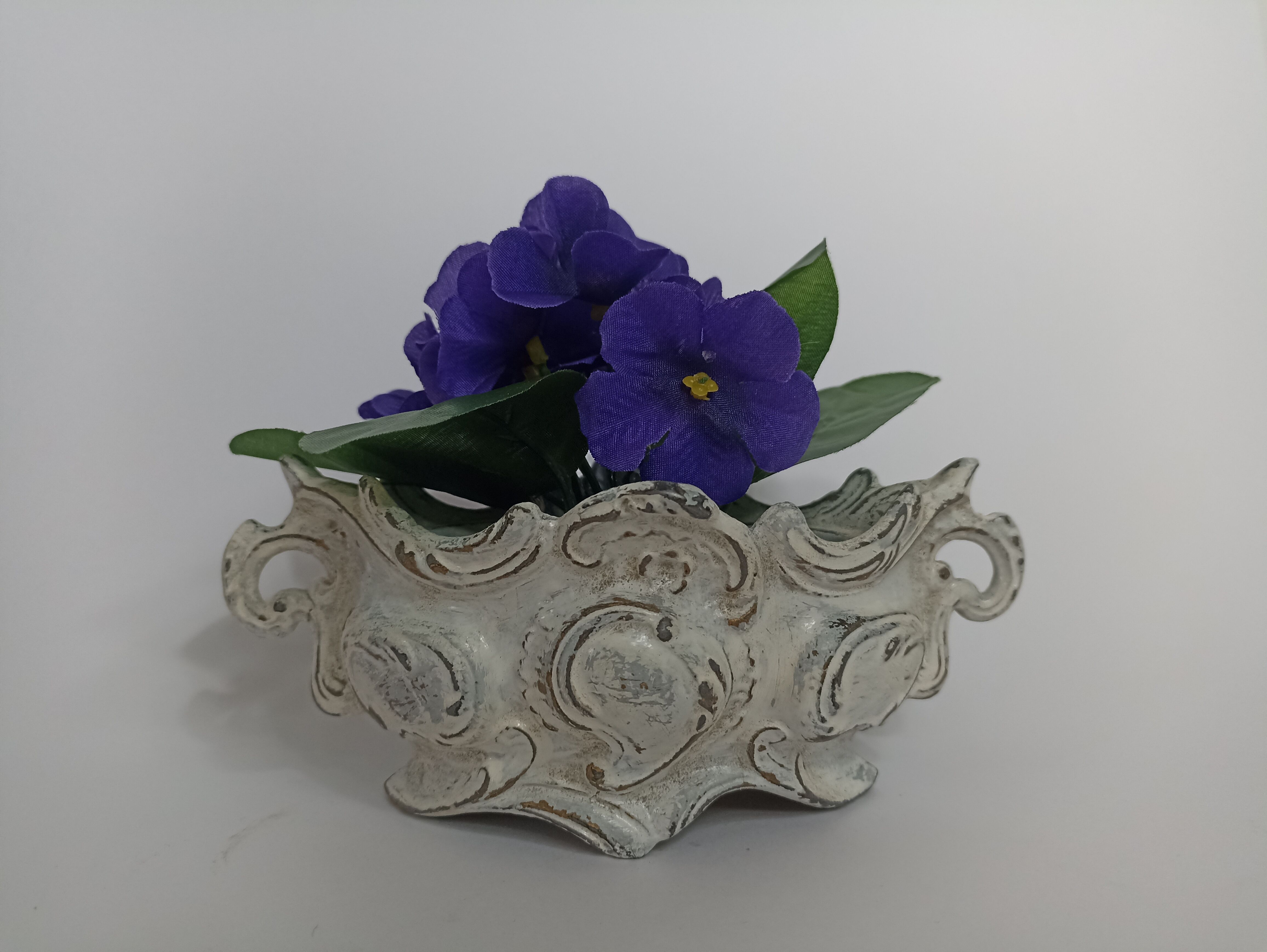 Old patinated cast iron planter
