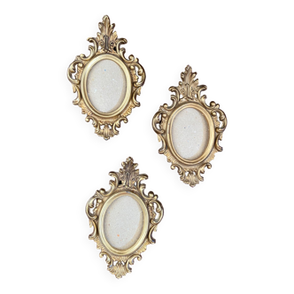 3 gilded baroque frames.