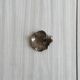 Small silver metal pocket emptier