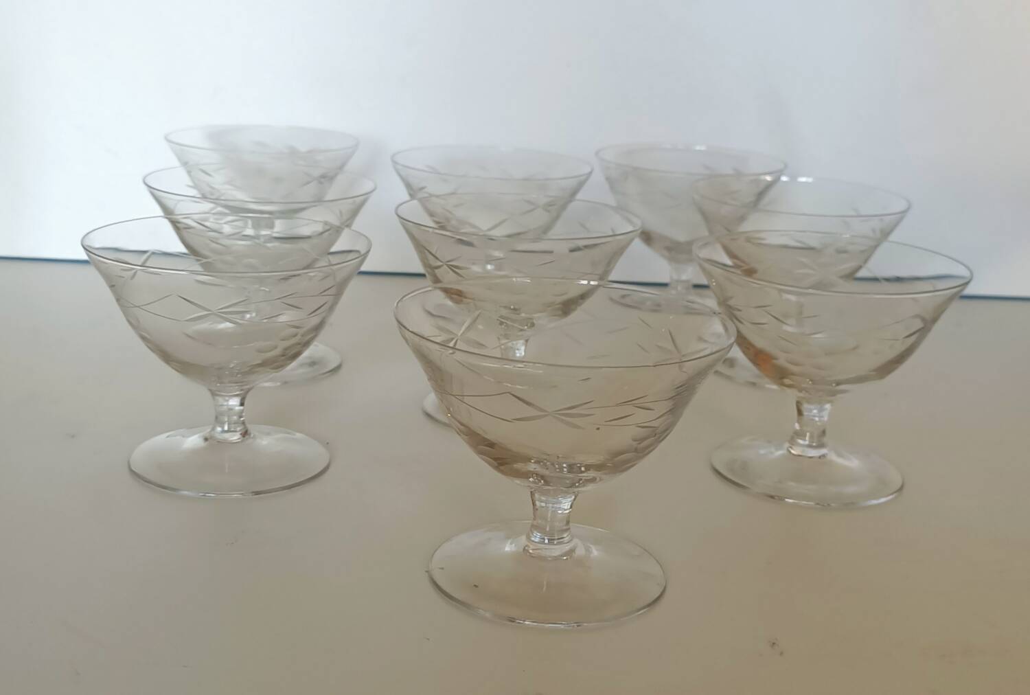 9 hand-cut art deco champagne glasses