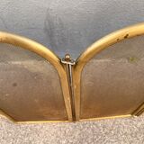 Antique brass fireplace screen from 1920, vintage spark guard.