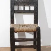 17th-century farmhouse chair with carved motifs – wabi sabi