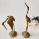 Brass heron duo