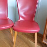 Baumann skai red imitation leather chairs from the 1950s