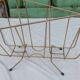 Vintage magazine rack in golden brass