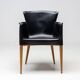 Set of four Vela leather armchairs by Carlo Bartoli - Italian modern elegance.