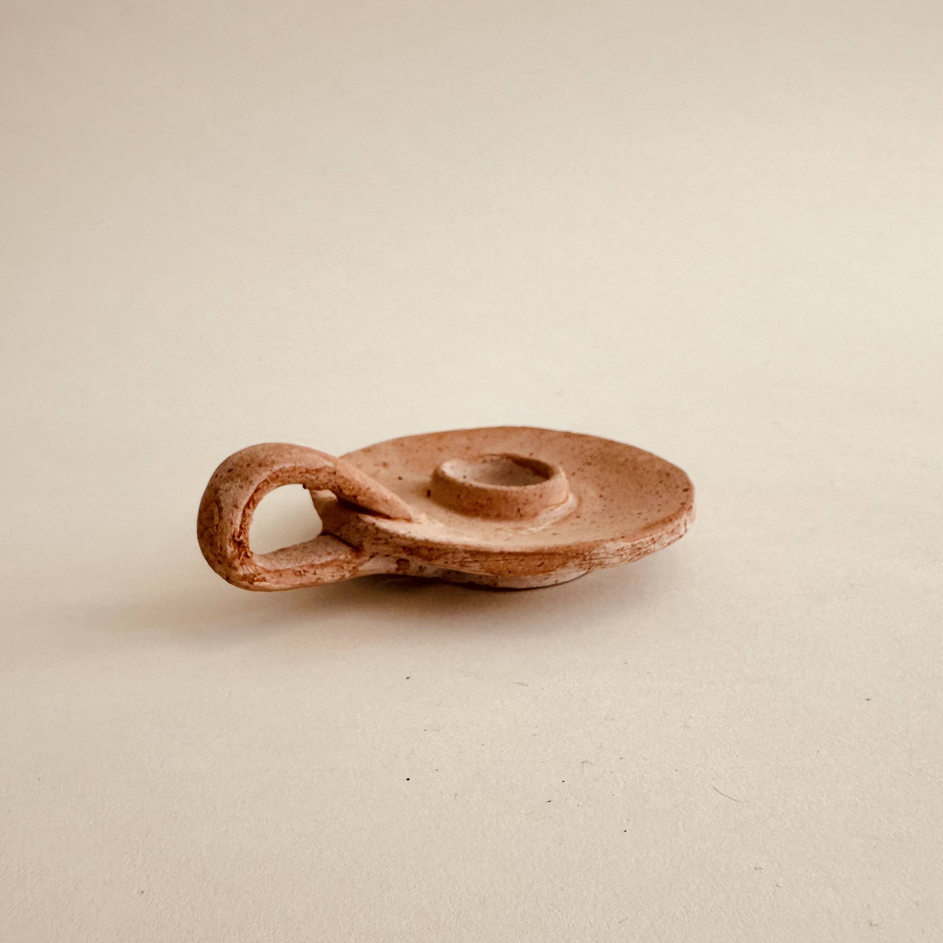 Terracotta candle holder
