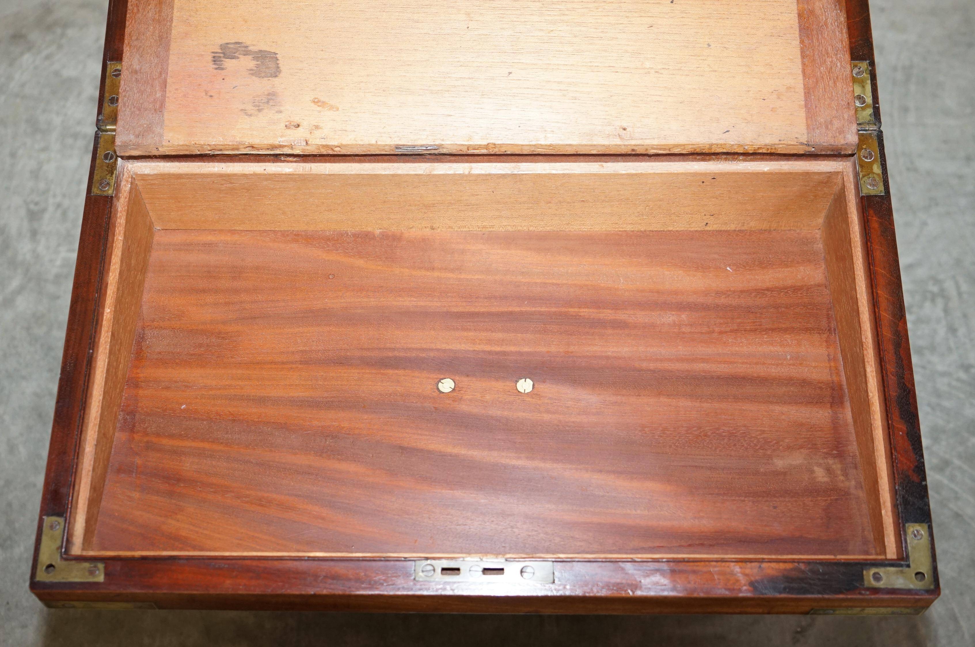 Antique hardwood military campaign desk with writing slope.
