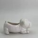 Ceramic dog-shaped planter
