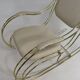 60s rocking chair in brass and ecru faux leather