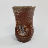 Accolay décor of face ceramic vase